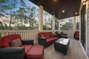 The Deck with Outdoor Seating Sets, Coffee Table, and Ottomans.
