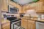 Fully Equipped Kitchen with Breakfast Bar, Granite Countertops and Stainless Steel Appliances