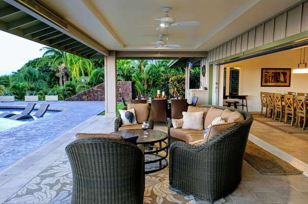 Spacious Lanai with Outdoor Sofas, Dining Table and Chairs