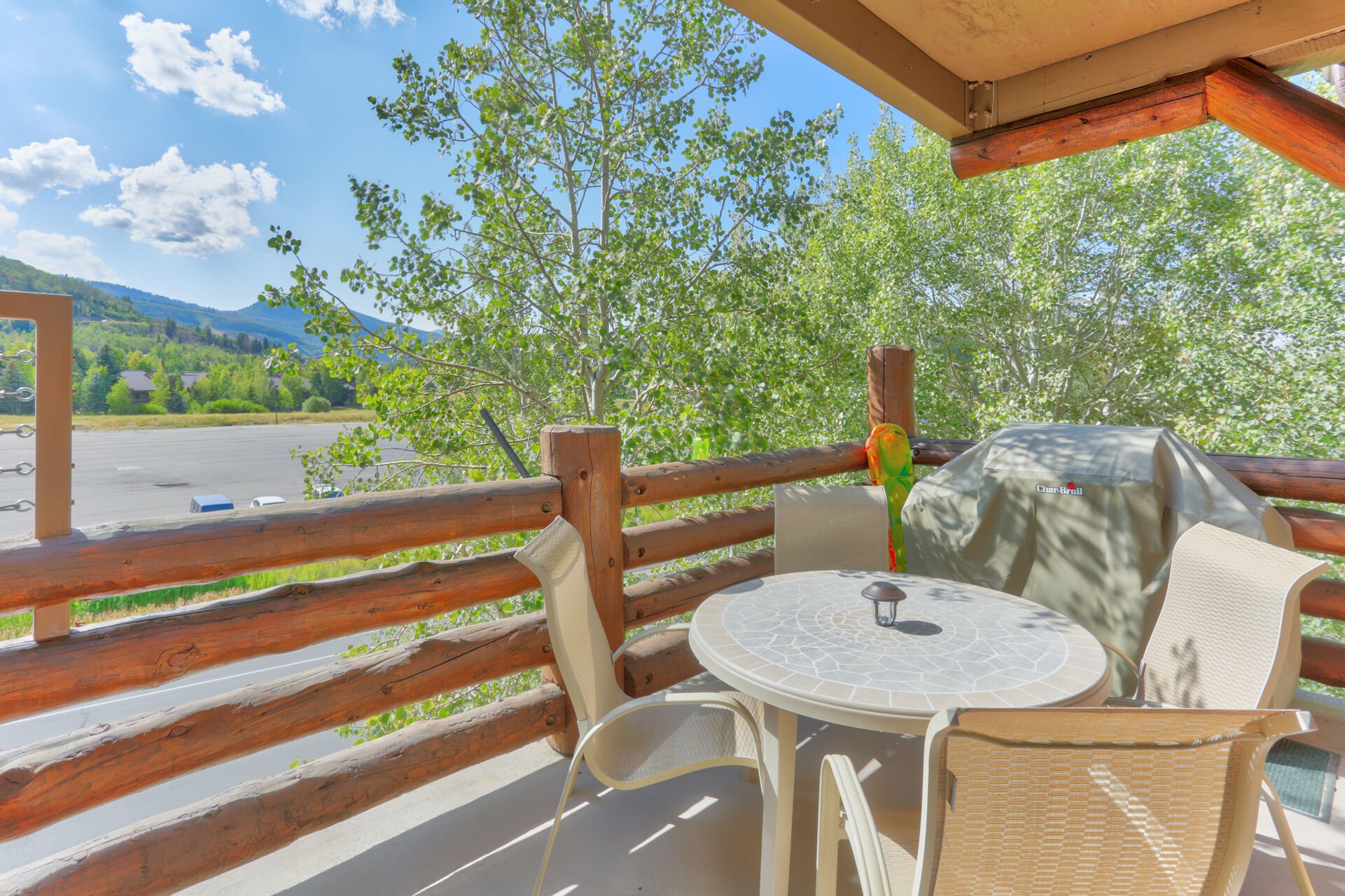 BBQ and Patio Seating with Mountain Views from the Private Deck