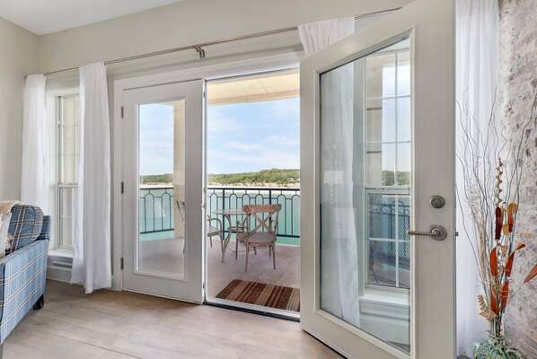 French doors open onto the expansive balcony to let in the breeze and the calming sound of the lake.