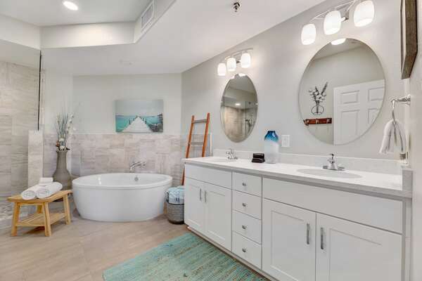 Plenty of space to prepare for whatever the day brings with double sinks and again.... that bathtub...