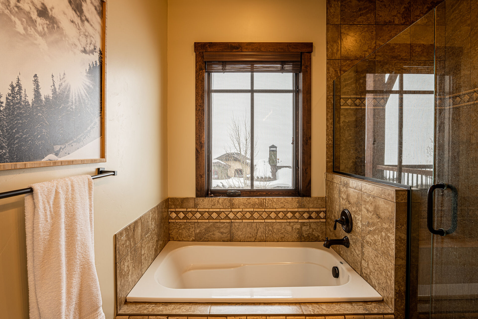 Upper Level Master Bath with Dual Sinks, a Soaking Tub and Separate Tile Shower