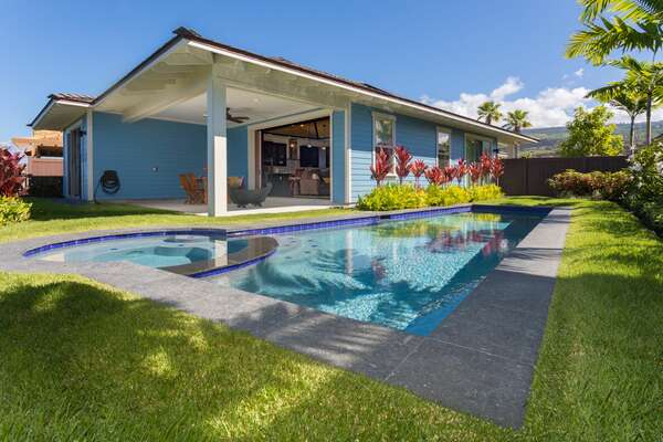 The back exterior and pool of this Kona Hawaii vacation rental.