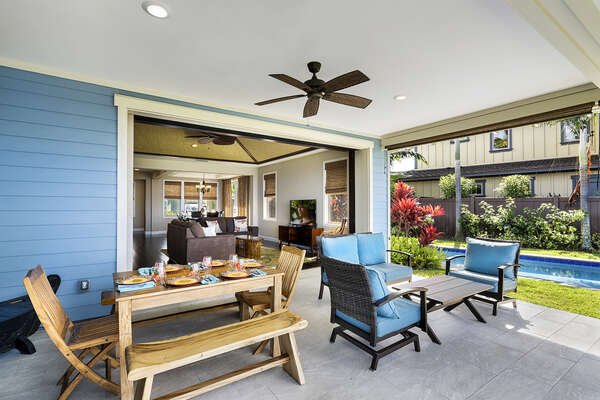 The back lanai with lounge and dining areas.