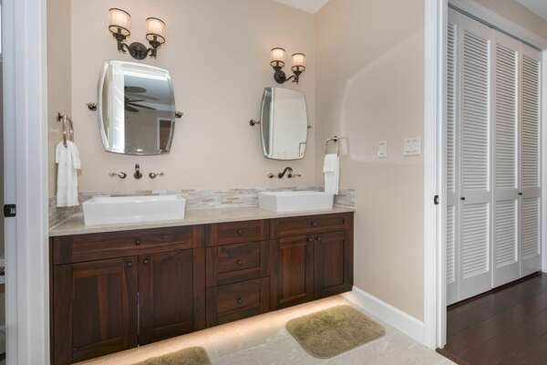 Bathroom 2 with side-by-side vanity sinks.