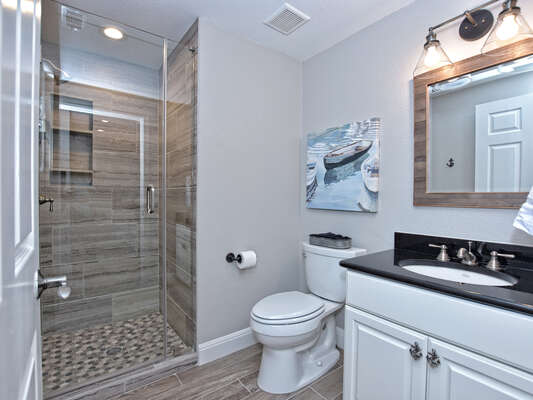 Guest bathroom accessible by hallway- shampoo, conditioner and body wash included!