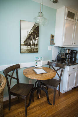 Seating for two at this cute table!  There are also 2 barstools at the end of the counter for more dining seating!