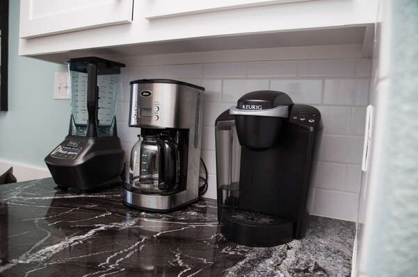 The dry bar features a Keurig (with a couple of k-cups to get you started!), a drip coffee pot as well as a Ninja Blender!  We also provide all of the glassware you need for any type of drink you want to make!