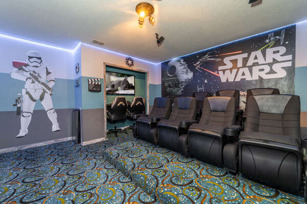 Star Wars themed movie theatre room with gaming nook.