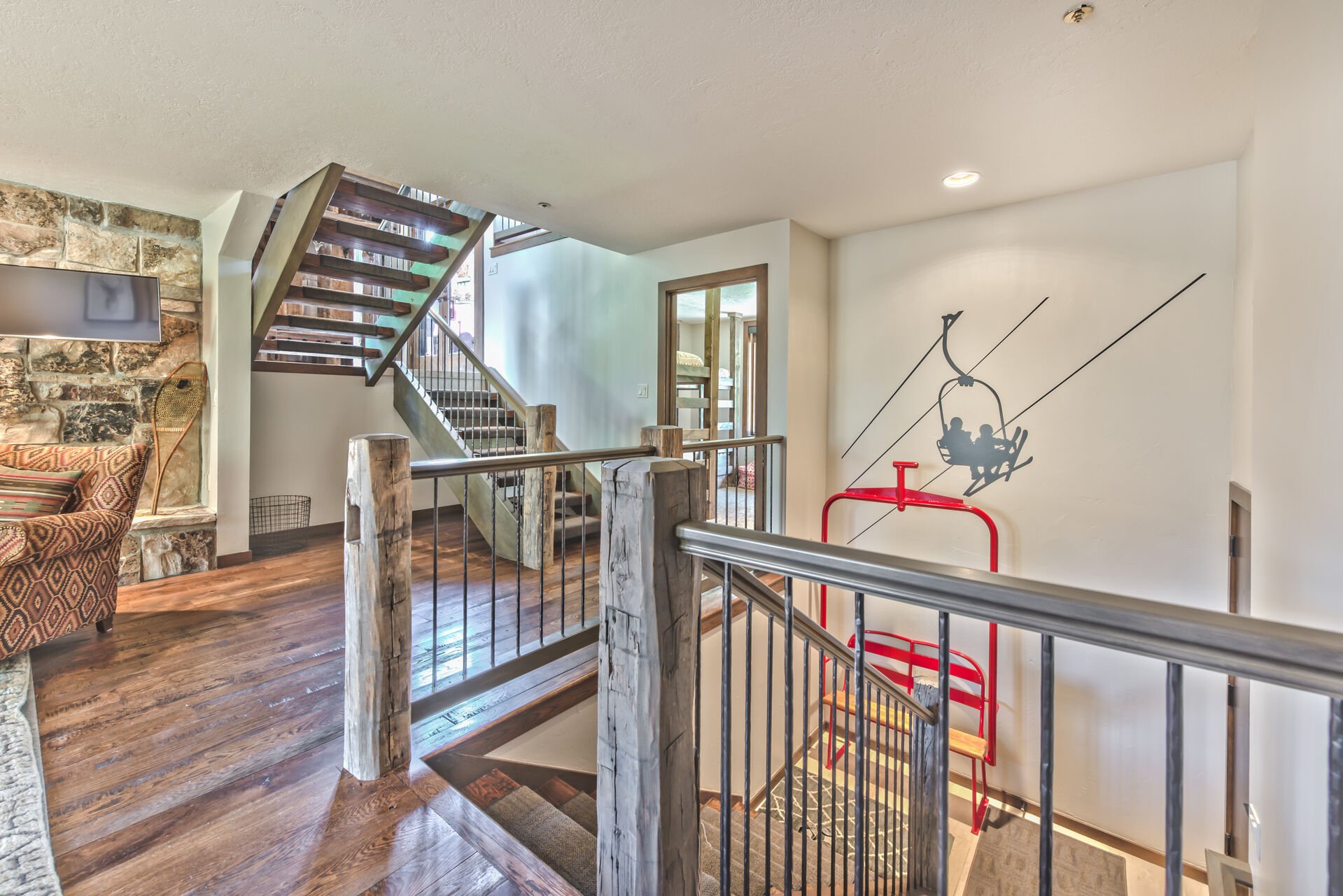 Stairway from Mid-Level to Lower Level Master Bedroom with Private Bath and Laundry Room