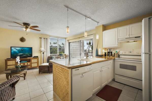 Fully Equipped Kitchen with fridge and oven.