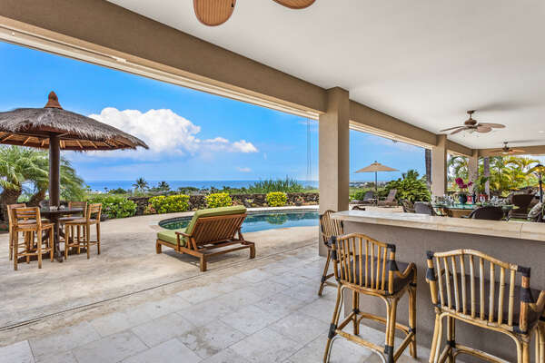 Covered Lanai with Plenty of Seating and Space for Entertainment
