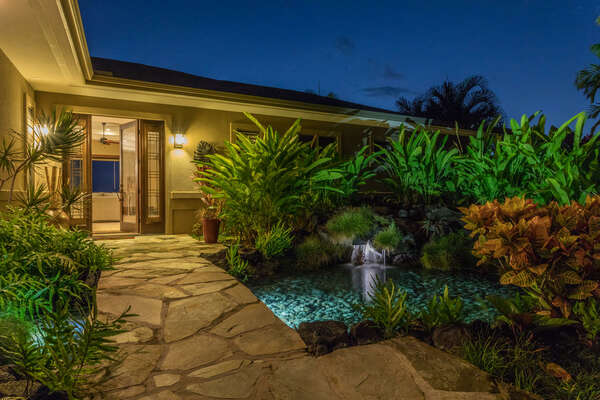 Front Entrance with Stone Path and Pond at Hale Akoa