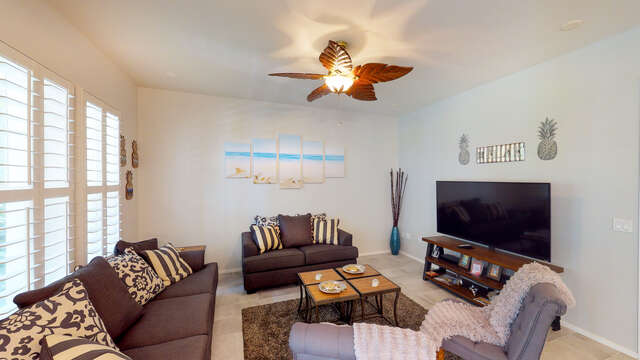 Large, Flat Screen TV & Comfortable Seating in the Living Area