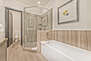 Master Bath with a Soaking Tub and Large Tile Shower with a Rain Shower Head