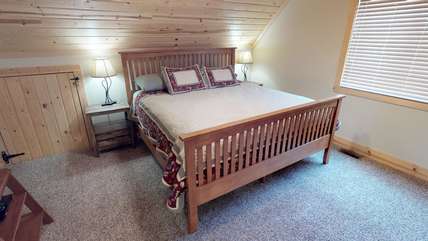 The master bedroom is located upstairs and offers plenty of room to relax.