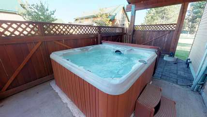 A secluded and private hot tub is one of the special things about this cute cabin.