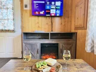 Although this place is small there is still room to cozy up on the couch and watch a movie.