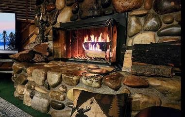 The wood-burning fireplace in the cabin is a true centerpiece, offering both warmth and charm to the space. Make sure to bring your own wood.