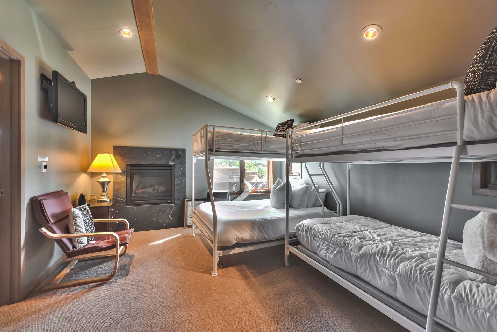 Level 3 (Entry Level) - Bunk Room with Twin over Full and Twin over Twin Bunk Beds with a Gas Fireplace and Private Bath