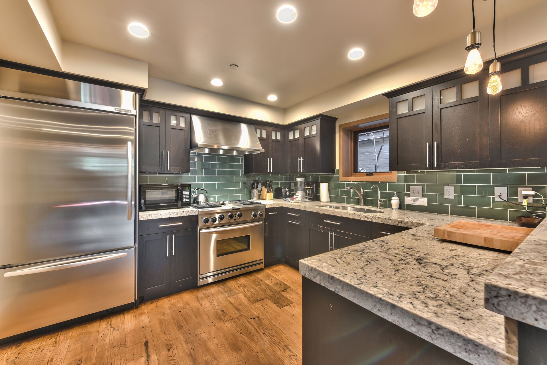 Fully Equipped Kitchen with Stainless Steel Appliances, High-end Touches and Hardwood Floors with Radiant Heat