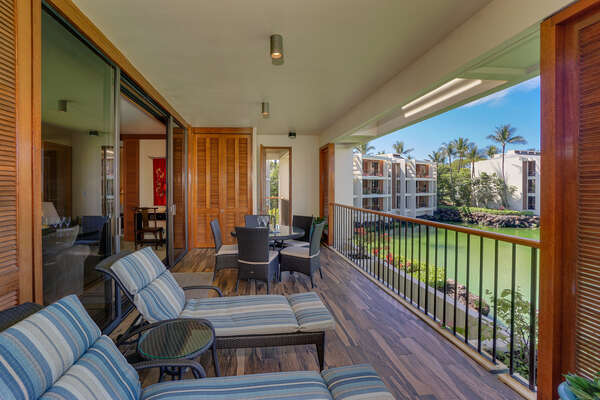 Lanai with Outdoor Lounge Chairs, Dining Table and Chairs
