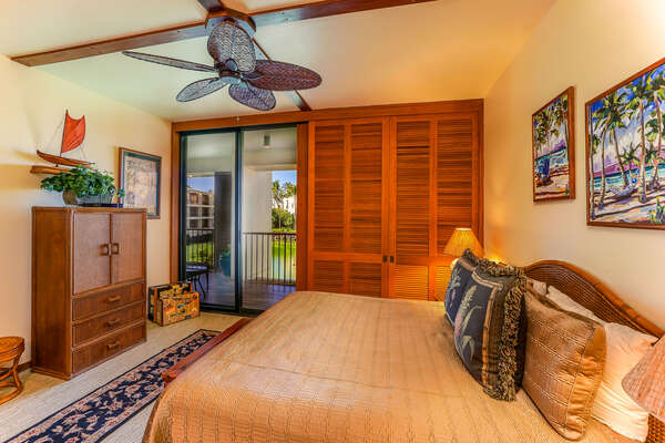 Sliding Doors to the Lanai, Large Bed, and Ceiling Fan
