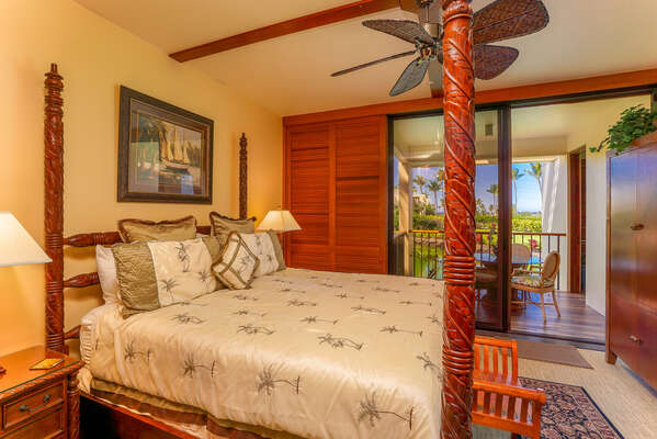 Bedroom with Lanai Access, Large Bed, and Ceiling Fan