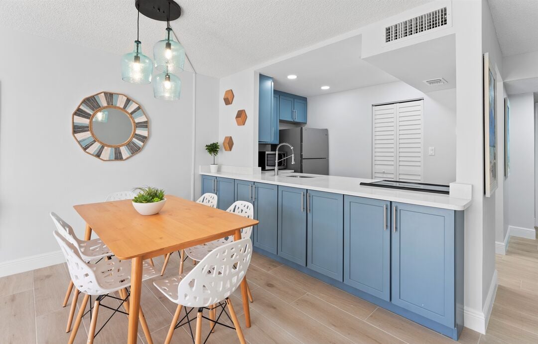 Gather around this chic dining space—enjoy easy meals, laughter-filled moments, and relaxed conversations by the beach