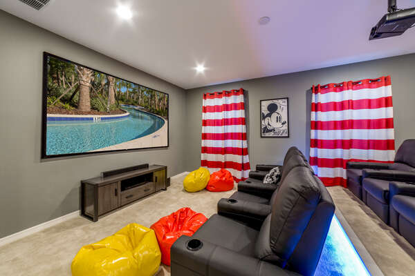 Mickey Mouse Themed Theater Room with Stadium Seating