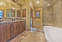 Grand Master Bathroom with Dual Sinks, Soaking Tub, Tile Shower and Private Deck