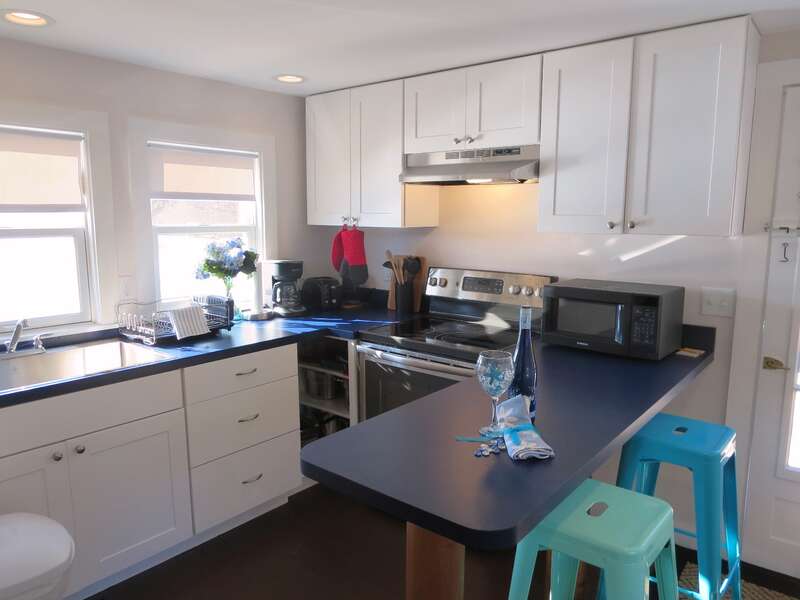 Kitchen offers all new appliances (no dishwasher) and a breakfast bar with 2 stools - 1047 Old Queen Anne Road Chatham Cape Cod - New England Vacation Rentals