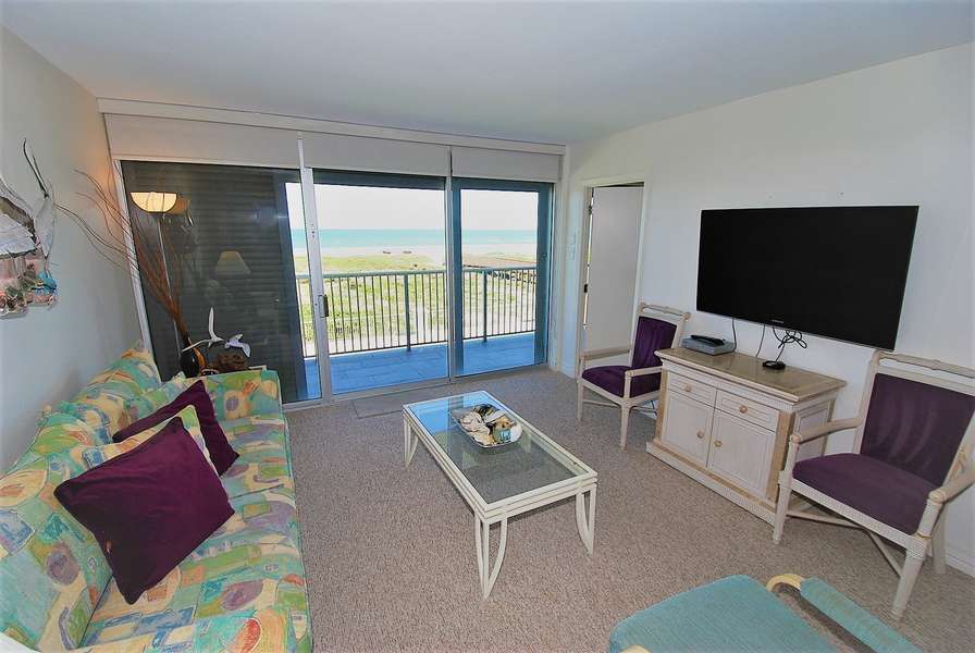 Living room with unobstructed view to the beach