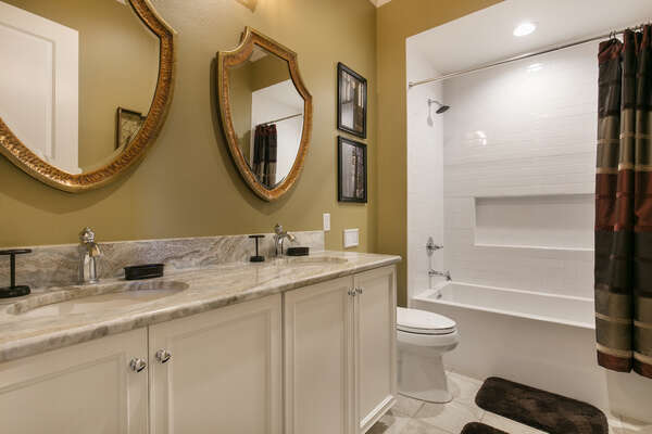 The kids` have a private bathroom with dual vanity and shower
