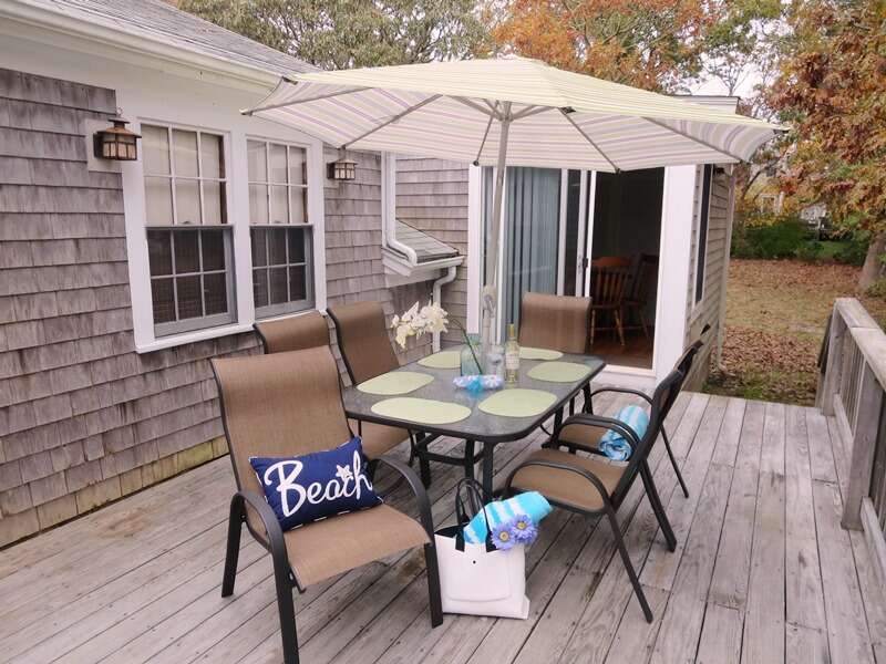 Sliders from the game room lead right out onto the deck  23 Ginger Plum Lane Harwich Port Cape Cod - New England Vacation Rentals