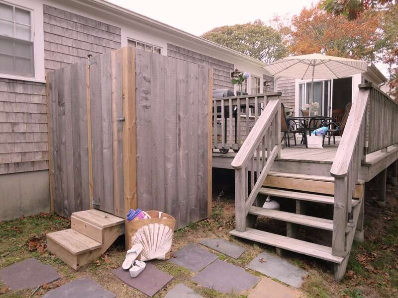 Just a couple steps from the deck is the outdoor shower with hot and cold water -  23 Ginger Plum Lane Harwich Port Cape Cod - New England Vacation Rentals