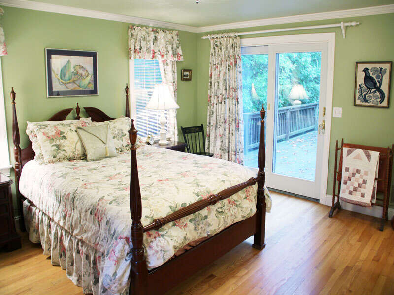 Master bedroom on 1st floor with sliders to back deck- 29 Ginger Plum Lane Harwich Port Cape Cod - New England Vacation Rentals