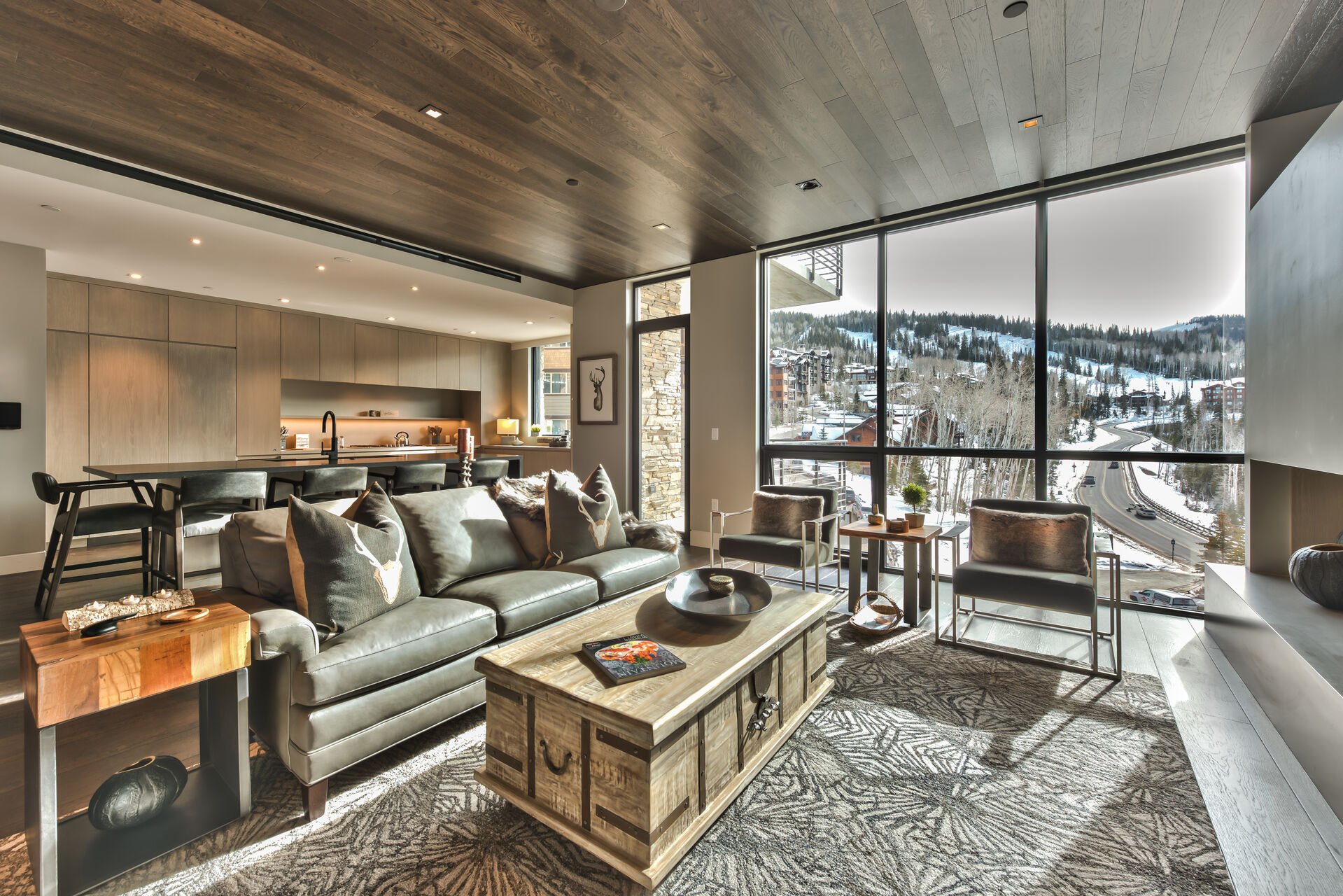Living Room, Kitchen, Balcony Access and Floor to Ceiling Mountain Views