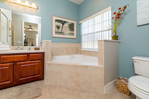 Luxury en-suite bathroom with a garden bath tub