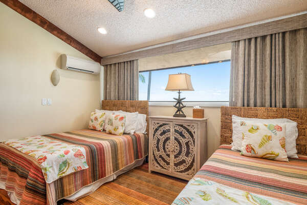 Air-conditioned Loft with Two Beds and Views of Palm Trees at Kona Hawaii Vacation Rentals