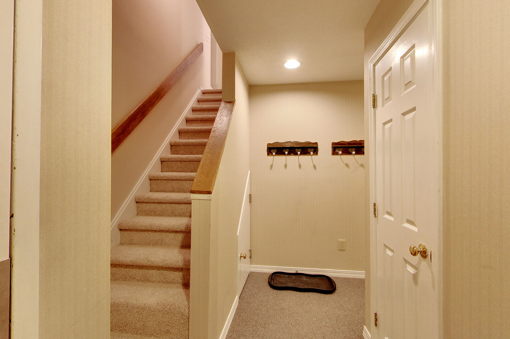 Hallway and stairs going to bedroom