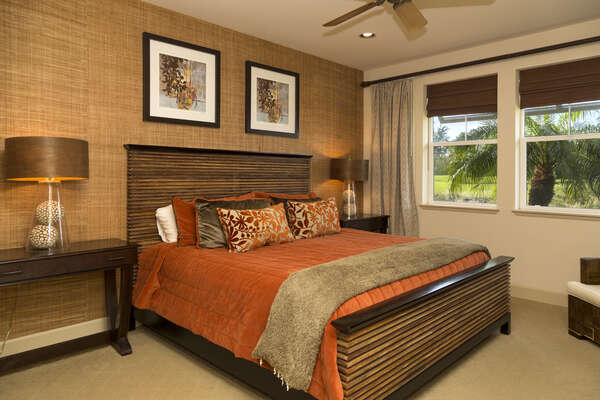 Master Bedroom with King Bed, nightstands, and views outside.