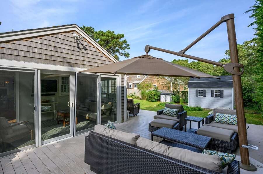 Outdoor living and adjacent sunroom -  19 Burton Avenue West Harwich -  Lobsta House- New England Vacation Rentals