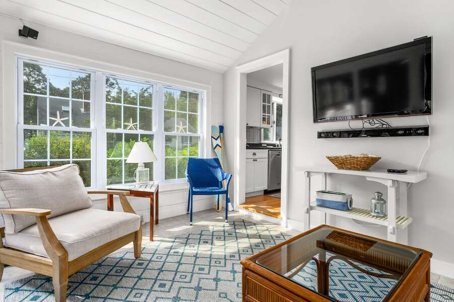 Spacious sun room off kitchen and onto the beautiful deck and outdoor space -19 Burton Avenue West Harwich -  Lobsta House- New England Vacation Rentals