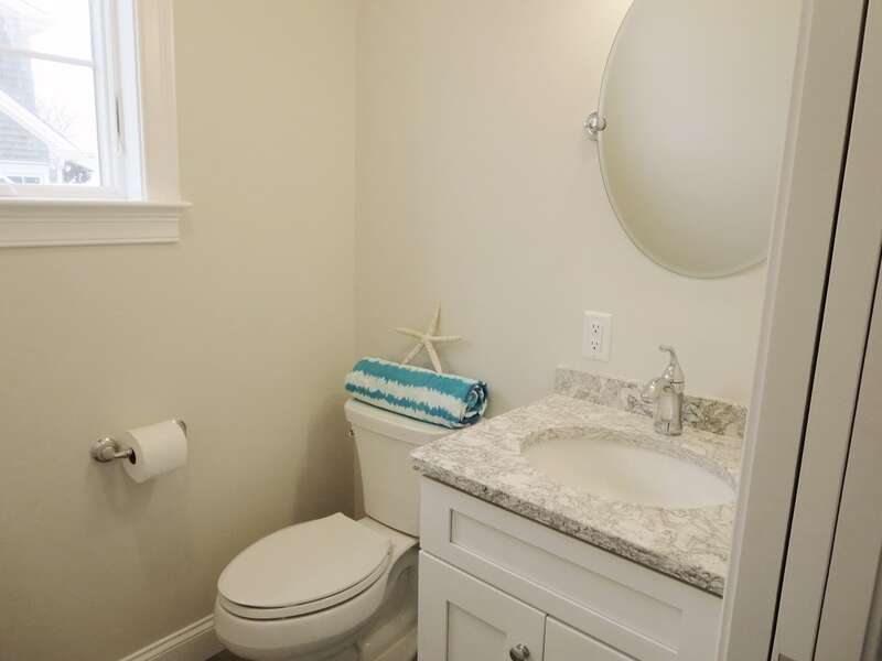 Half bath on first floor provides a great changing area as you come in from the deck or after using the outdoor shower - 1 Bayberry Lane Eastham Cape Cod - Bay Dream - NEVR
