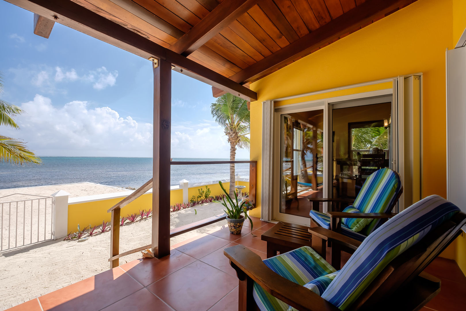 Casa De Bonita lower deck with private beach view. Front door view