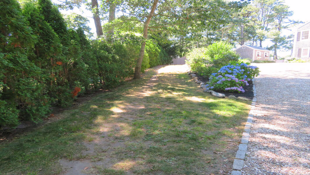 Deeded access to Long Pond steps from the driveway on the Cul-de-sac - 2 Mashpa Road Harwich Cape Cod - New England Vacation Rentals- #BookNEVRDirectHarwichFamilyTides