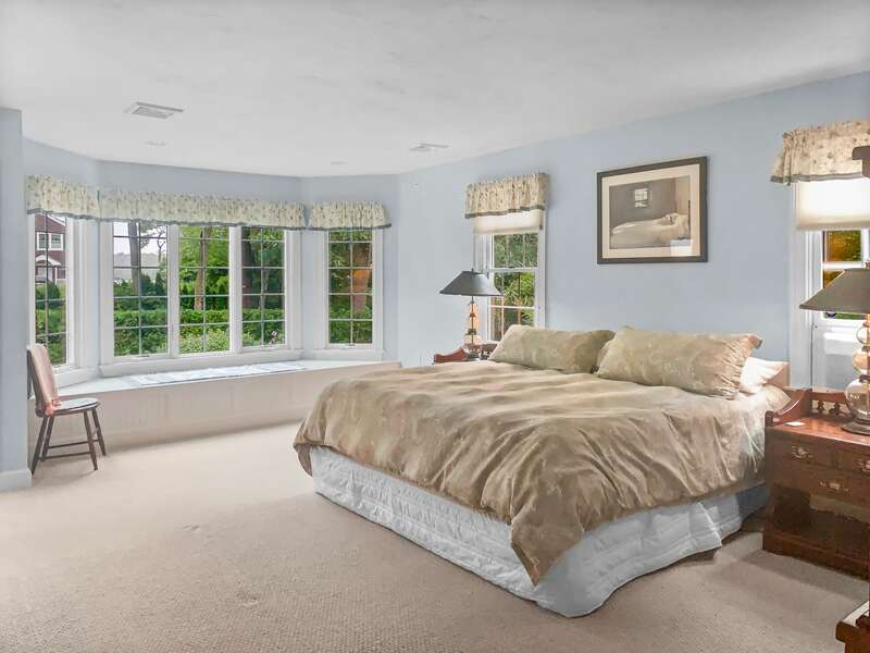 Bedroom #1 with a King bed, flat screen TV, and en suite bathroom - 2 Mashpa Road Harwich Cape Cod - New England Vacation Rentals- #BookNEVRDirectHarwichFamilyTides