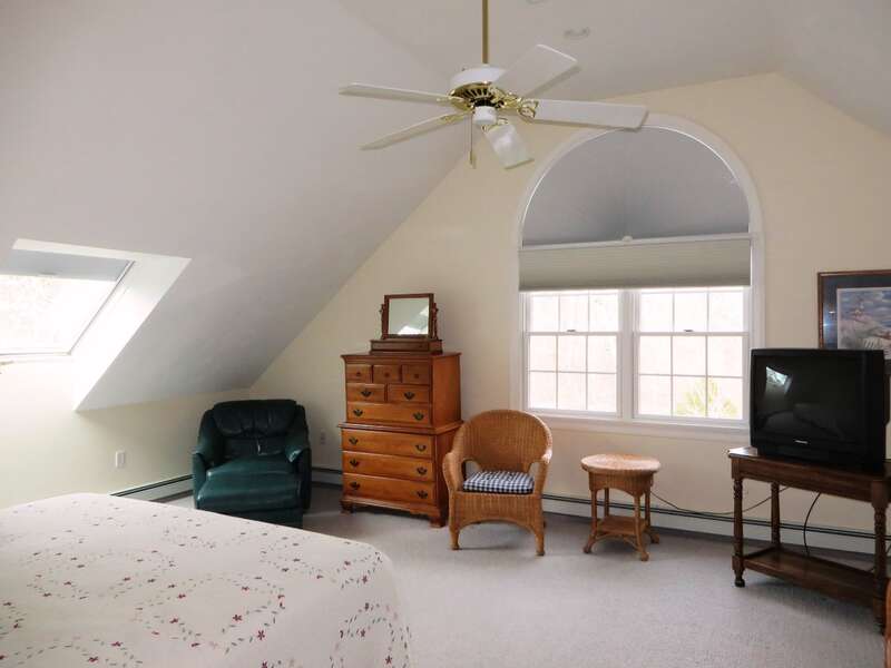 Located above the garage, Bedroom #2 has 1 Queen bed, 2 Twin Beds, and a TV - 2 Mashpa Road Harwich Cape Cod - New England Vacation Rentals- #BookNEVRDirectHarwichFamilyTides